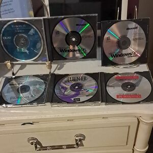 Microsoft Windows 95 and Office CD Set - Silver, Black, and Blue